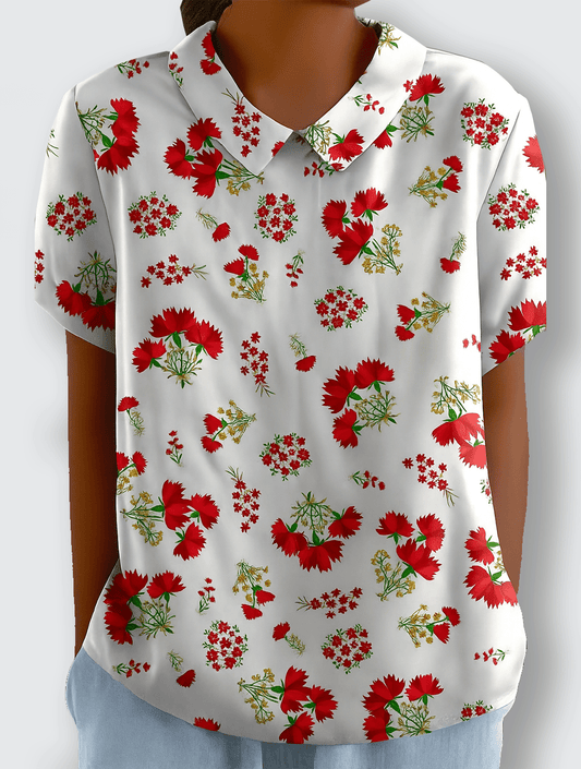 Betsey - Chic t-shirt med röda blommor och mjuk komfort - Véloria Studios