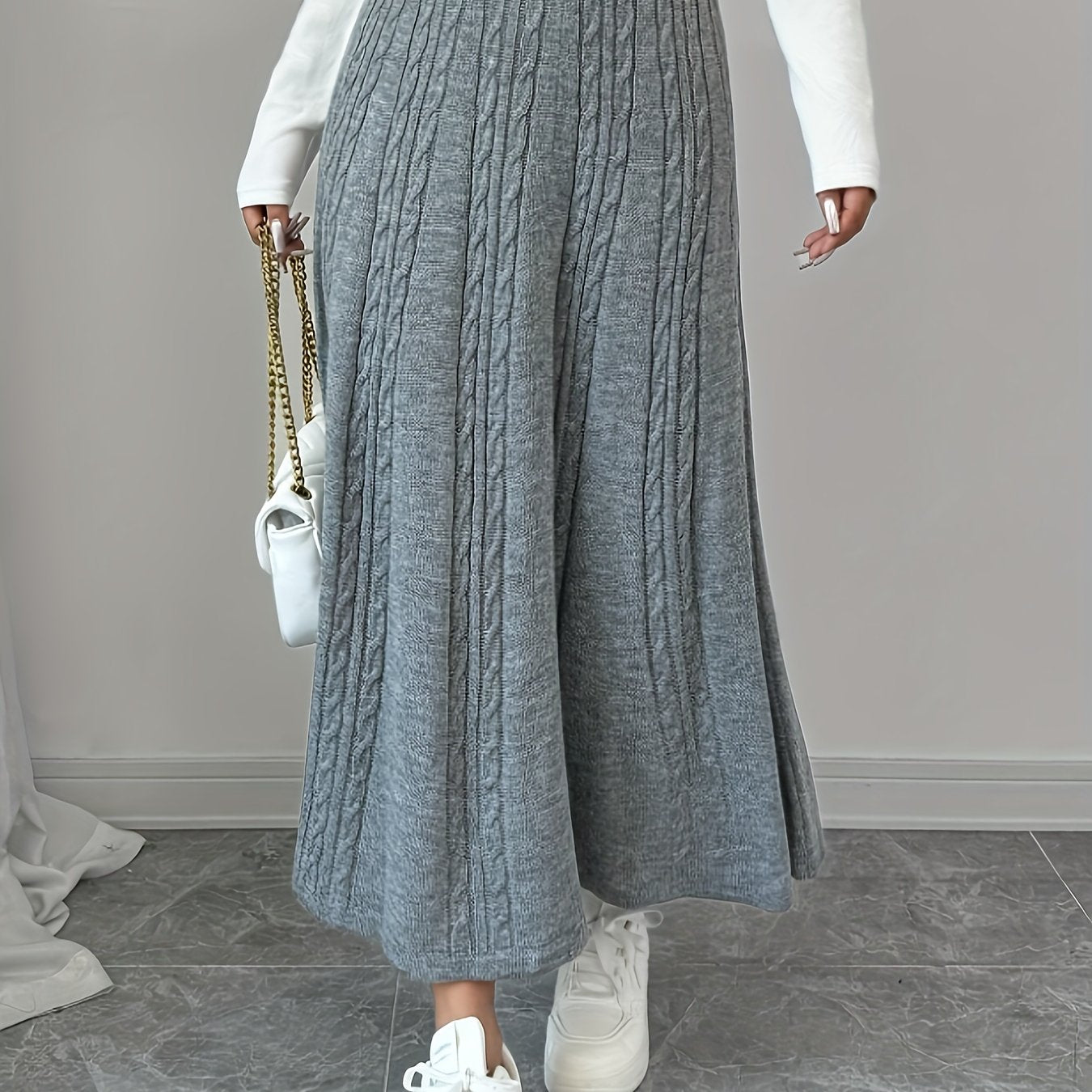 Aina – Klänningen som sveper med elegans