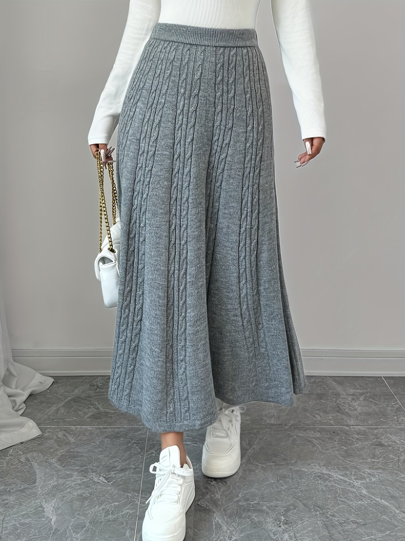 Aina – Klänningen som sveper med elegans