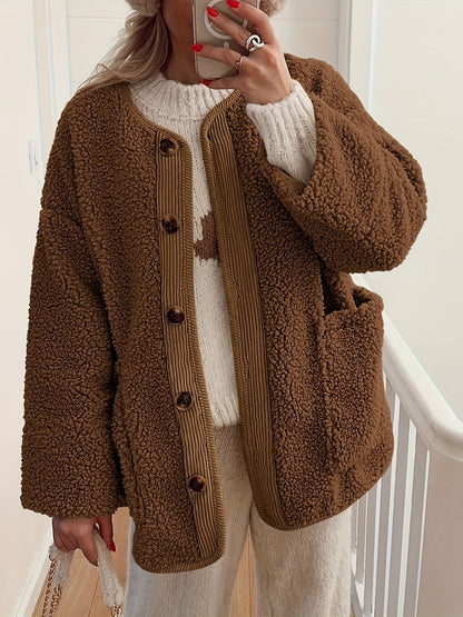 Ullrika – Elegant stickad topp med fickor