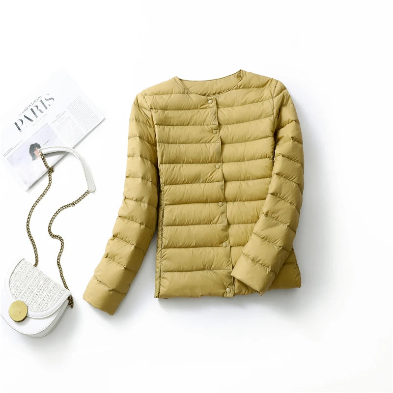 Tindra – Den eleganta dunvästen för stilfulla vinterdagar