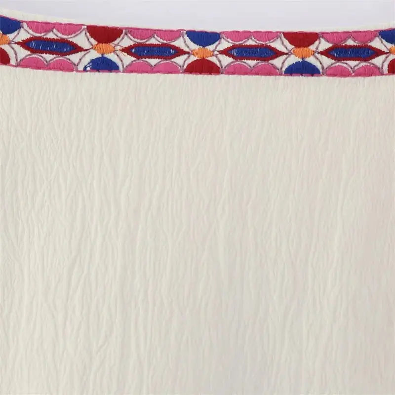 Astrid - Kort broderad väst