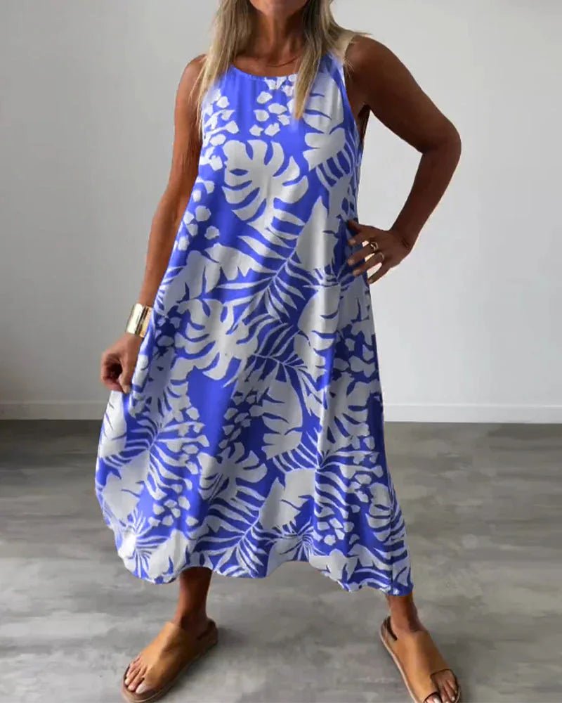 Anita - Ärmlös Sommarklänning med Tropiskt Bladmotiv - Véloria Studios