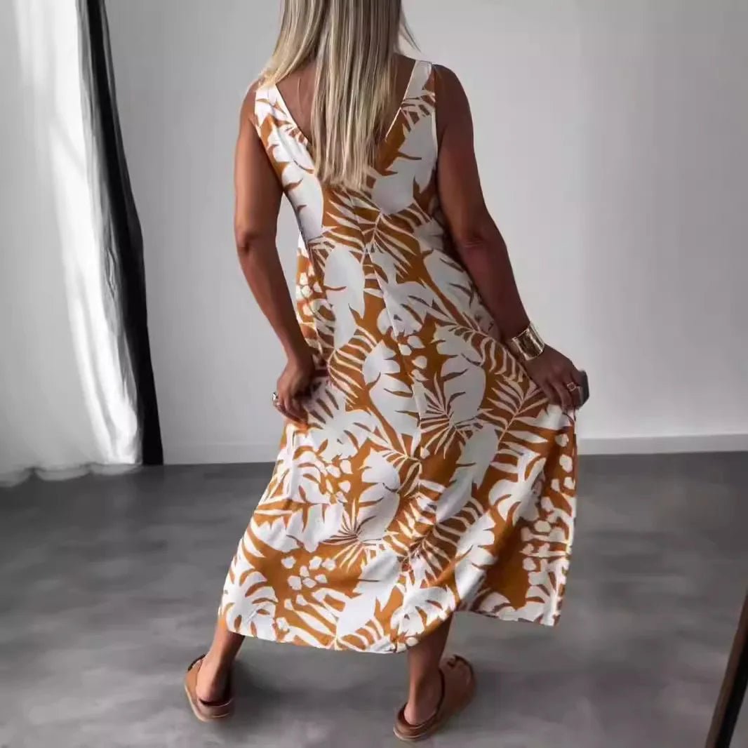 Anita - Ärmlös Sommarklänning med Tropiskt Bladmotiv - Véloria Studios